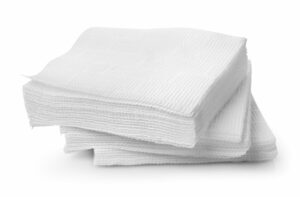 Stacked tissue paper sheets, representing hygiene and tissue paper production and softness requirements.
