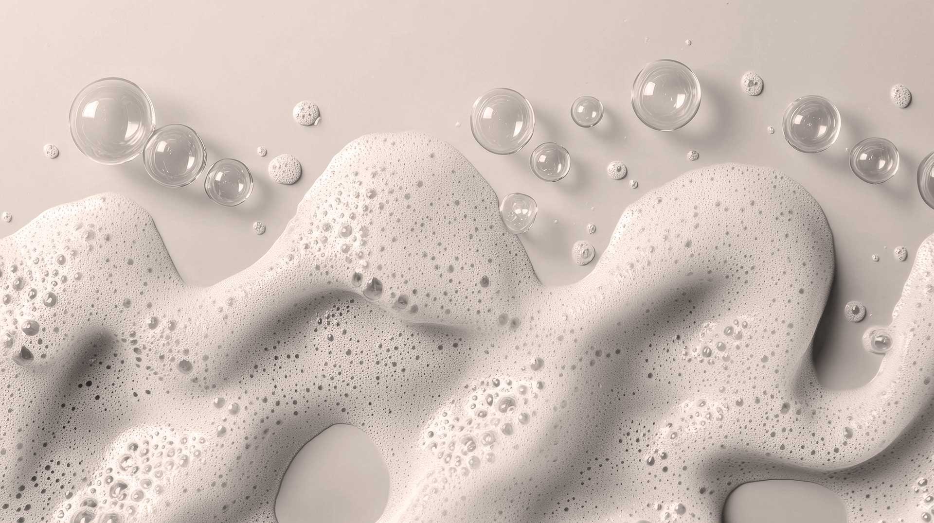 Close-up of foam and bubbles, illustrating defoaming and deaerating performance for paper process efficiency.
